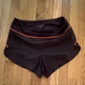 Athleta Women's Dark Shorts with Orange Accents